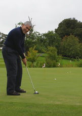 Dromoland Castle Hotel & Country Estate, Newmarket-on-Fergus, County Clare, Ireland - Edward F. Nesta Practicing His Putting