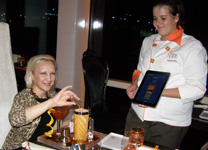 Debra making a cocktail - Celebrity Cruises - Qsine - Eclipse - photo by Luxury Experience