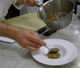 Chef Michael Anthony Plating the food- New York Culinary Experience - Photo by Luxury Experience