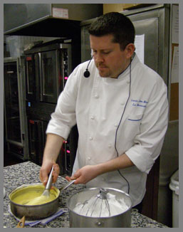 Chef Laurie Jon Moran - folding passion fruit mixture - photo by Luxury Experience 