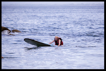 Taking a plunge off Paddleboard - Costa Sur Resort - Puerto Vallarta, Mexico - photo by Luxury Experience