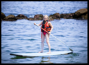 Debra on Paddleboard - Costa Sur Resort - Puerto Vallarta, Mexico - photo by Luxury Experience