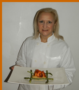 Debra C. Argen  with Shrimp Dish - photo by Luxury Experience