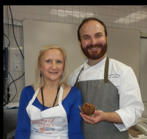 Chef miroslav Uskokovic and Debra C. Argen with pudding = Photo by Luxury Experience