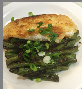 Fried Bronzino and Green Beans plate - photo by Luxury Experience