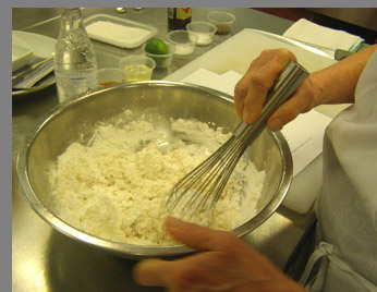 Mixing Batter for fried fish - Chef Paul Liebrandt - New York Culinary Experience - photo by Luxury Experience