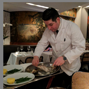 Rafael Filleting Bronzini tableside - The Leopard at des Artistes NYC - photo by Luxury Experience  