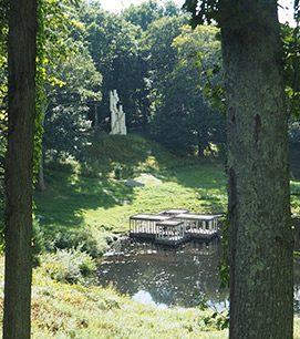 Tower Statue and Pavilion in the pond - - photo by Luxury Experience