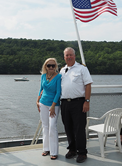 Debra C. Argen and Captain Jim McCann - Hudson River Cruises - photo by Luxury Experience