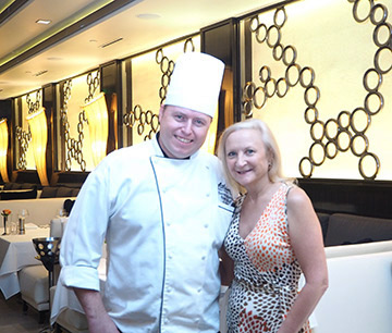 Chef Darren Stanley, Debra C. Argen - photo by Luxury Experience