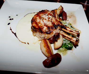 Grilled Pork Chop - Revival Kitchen and Bar - Concord, NH - photo by Luxury Experience
