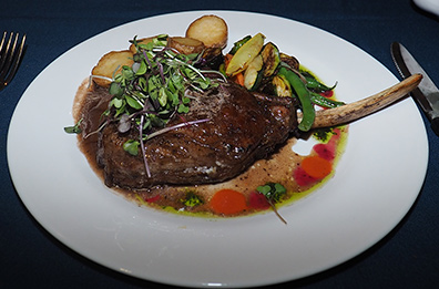 Claude's at Southampton Inn - Double Cut Veal Chop - photo by luxury experience