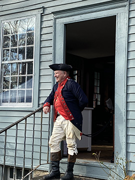 Glebe House - Jim Howson in Military Attire - Photo by Luxury Experience