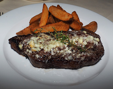 Rib Eye with Old Stove Pub Potatoes - Old Stove Pub NYC - photo by Luxury Experience