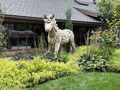 he Abbey Inn & Spa - Driftwood Horse Sculpture - photo by Luxury Experience