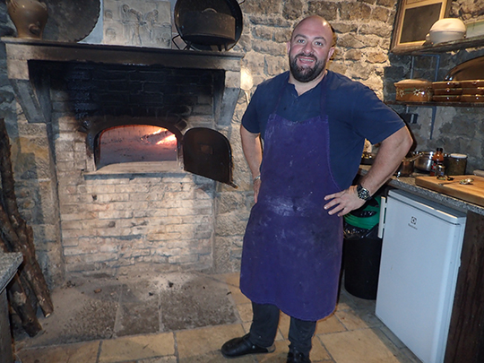 Chef Joss Rober - 15th Century Pizza Oven - photo by Luxury Experience