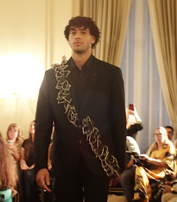 Diana Mahrach - Black two button gold embellishment shoulder to hem - photo by Luxury Experience