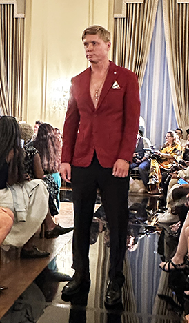 Diana Mahrach - Crimson Jacket with black pants - photo by Luxury Experience
