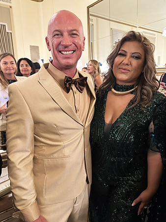 Diana Mahrach - tan suit tan shirt - photo by Luxury Experience