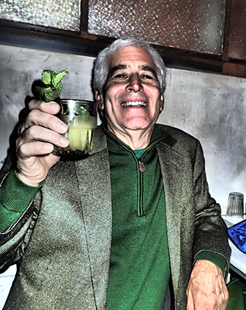 Edward F. Nesta drinking Death in the Afternoon cocktail - photo by Luxury Experience