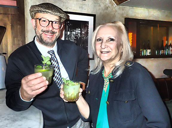 Joe Nelson & Debra C. Argen drinking Death in The Afternoon Cocktail - photo by Luxury Experience