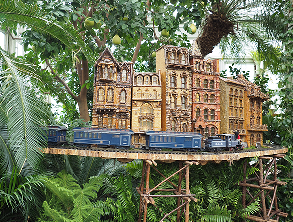 Train in front of row houses - photo by Luxury Experience