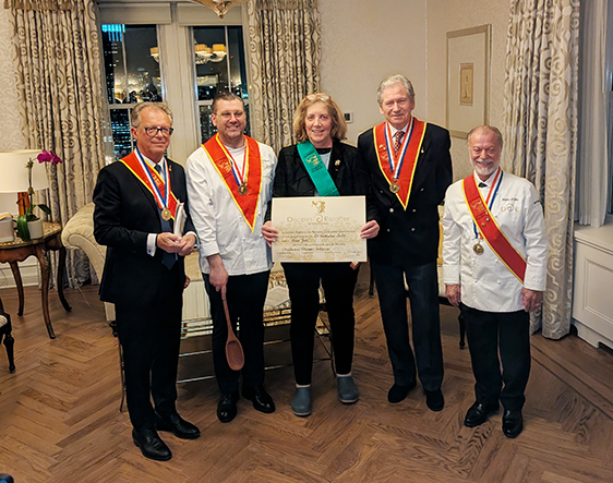 Ariane Daguin Awarded Green Scarf Les Disciples Escoffier - photo by Luxury Experience