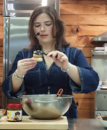 Chef Alessandra Ciuffo Spooning Tuna Quenelles on Crispy Rice - photo by Luxury Experience