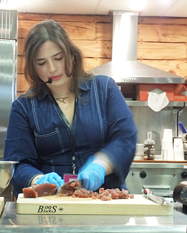 Chef Alessandra Ciuffo chopping tuna - photo by Luxury Experience