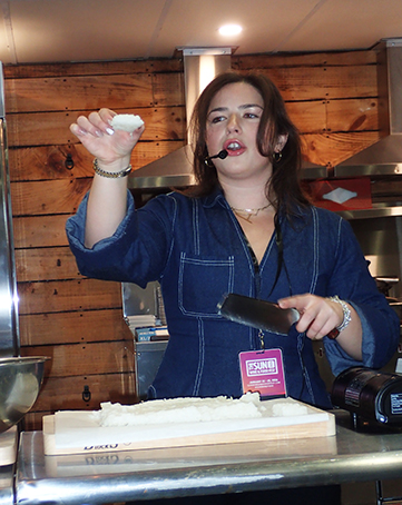 Chef Alessandra Ciuffo displaying crispy rice - photo by Luxury Experience