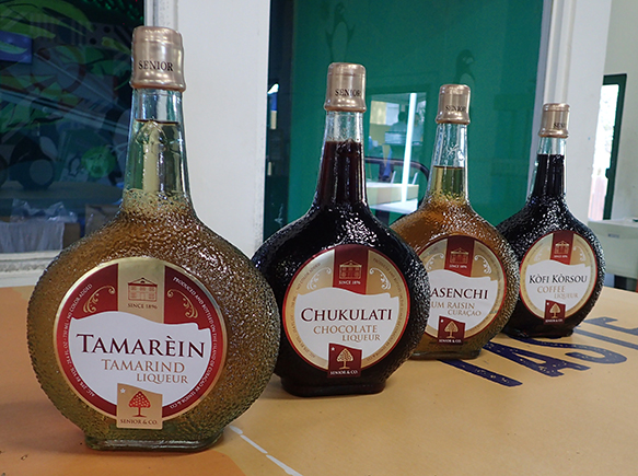 Curaçao FlavoredLiqueur Bottles - photo by Luxury Experience