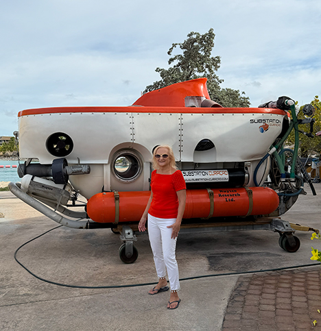 Curasub Adventure - Debra C. Argen standing next to Curasub - photo by Luxury Experience